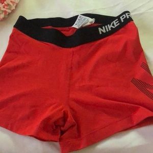Red and black nike pro spandex